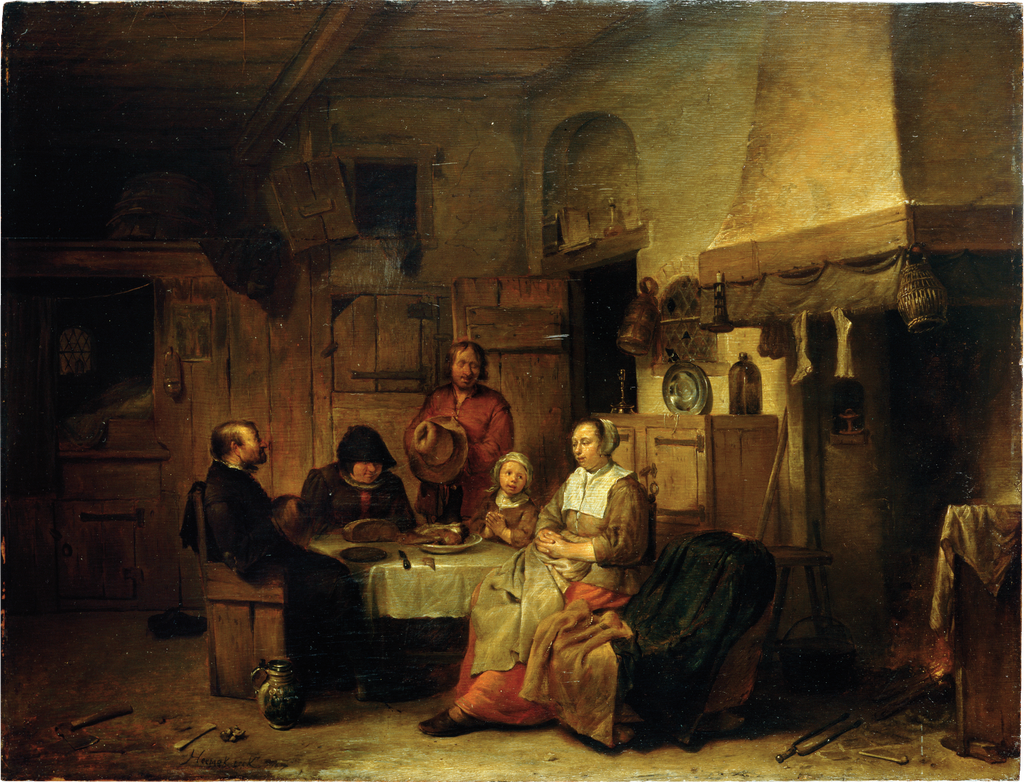 Eine vor der Mahlzeit betende Familie;Das Tischgebet